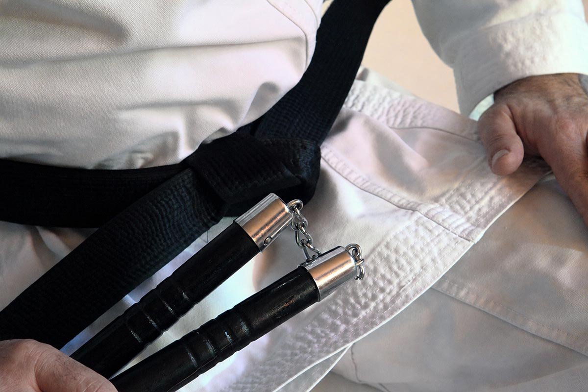 Black belt Taekwondo training with nunchaku at US Taekwondo Center